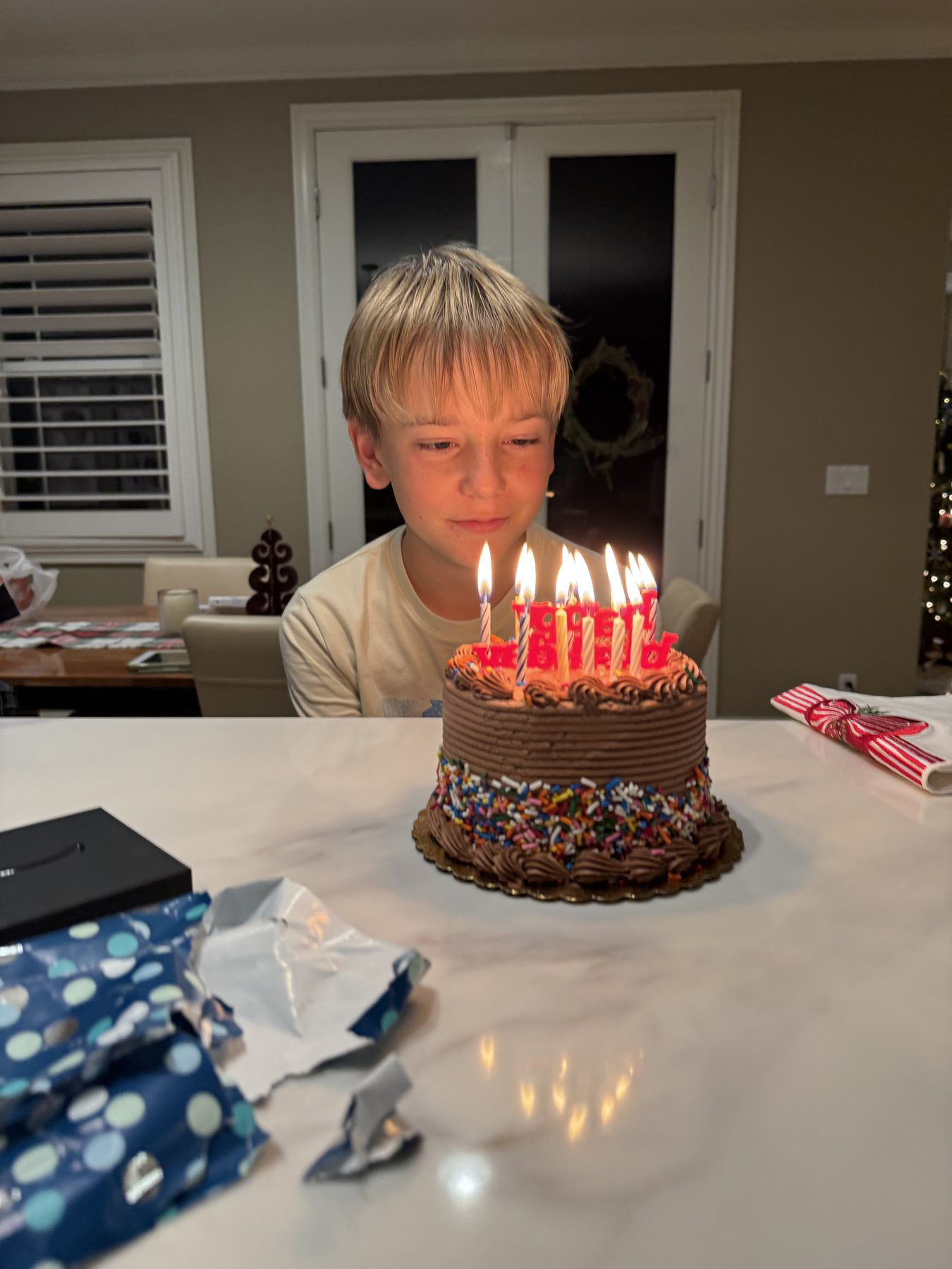 Birthday cake with lit candles