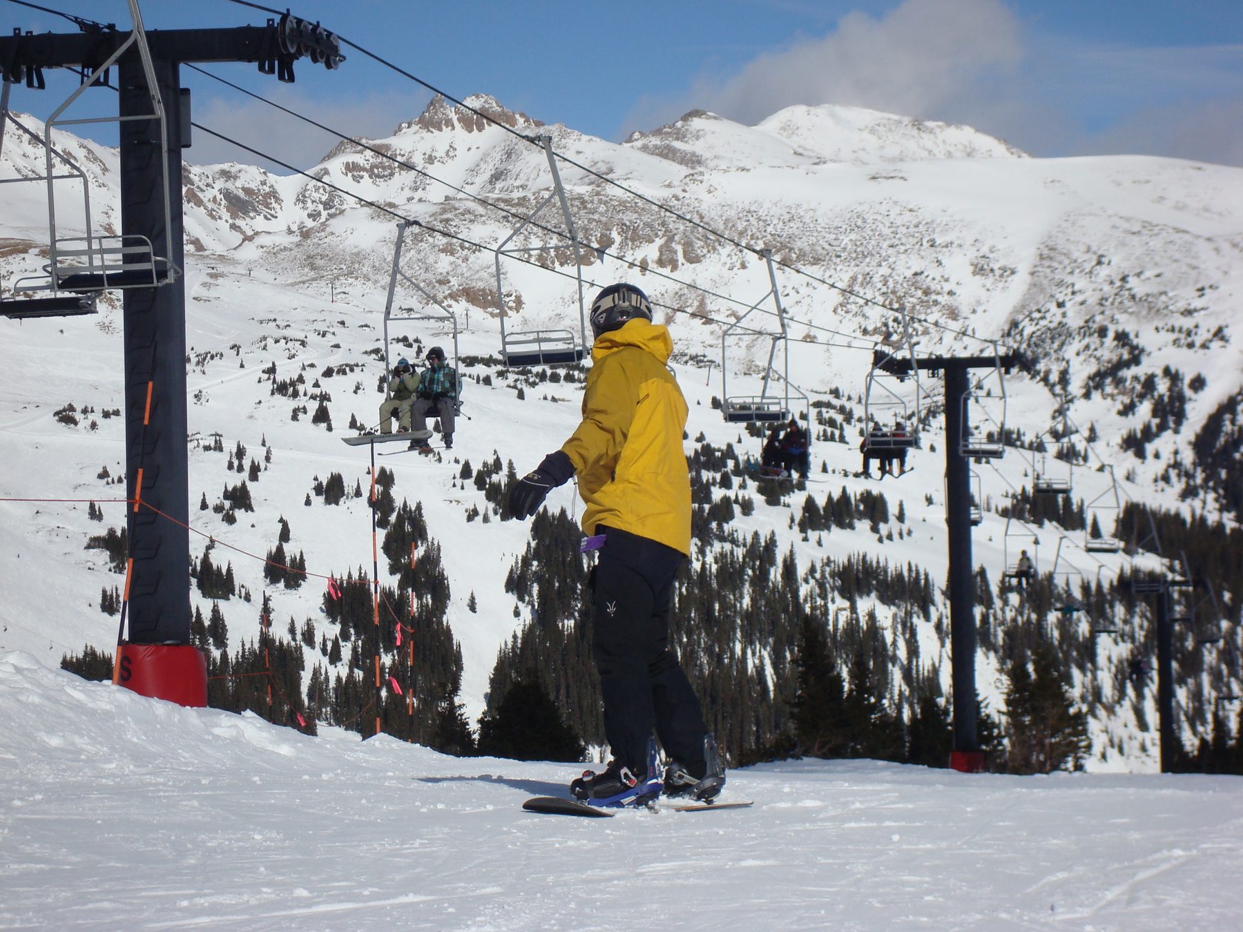 Snowy ridgeline from a ski lift