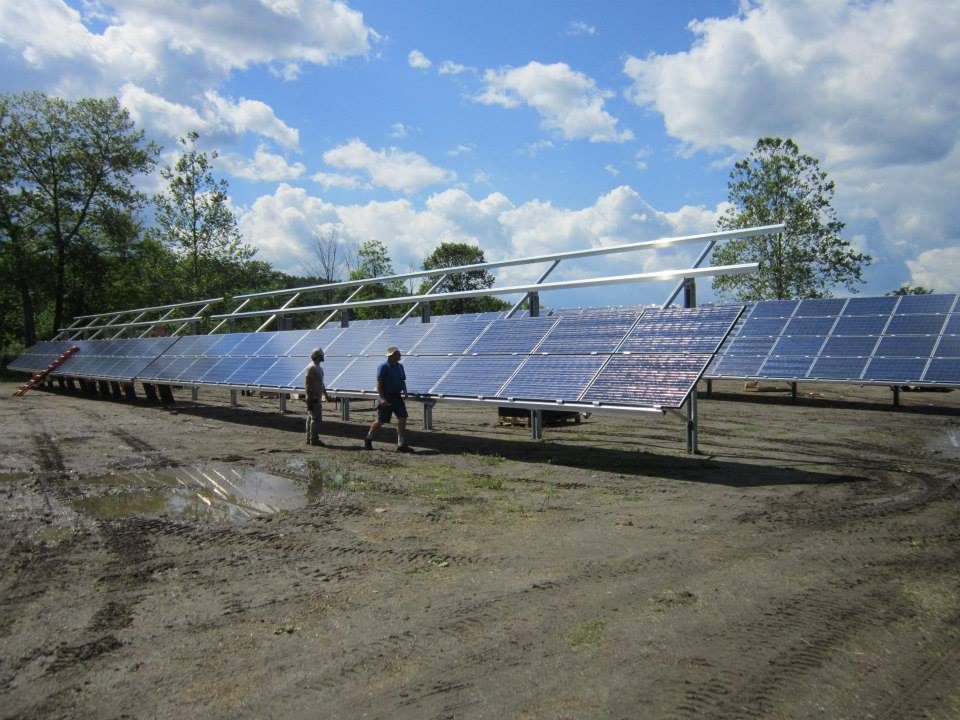 Solar panel installation team on site