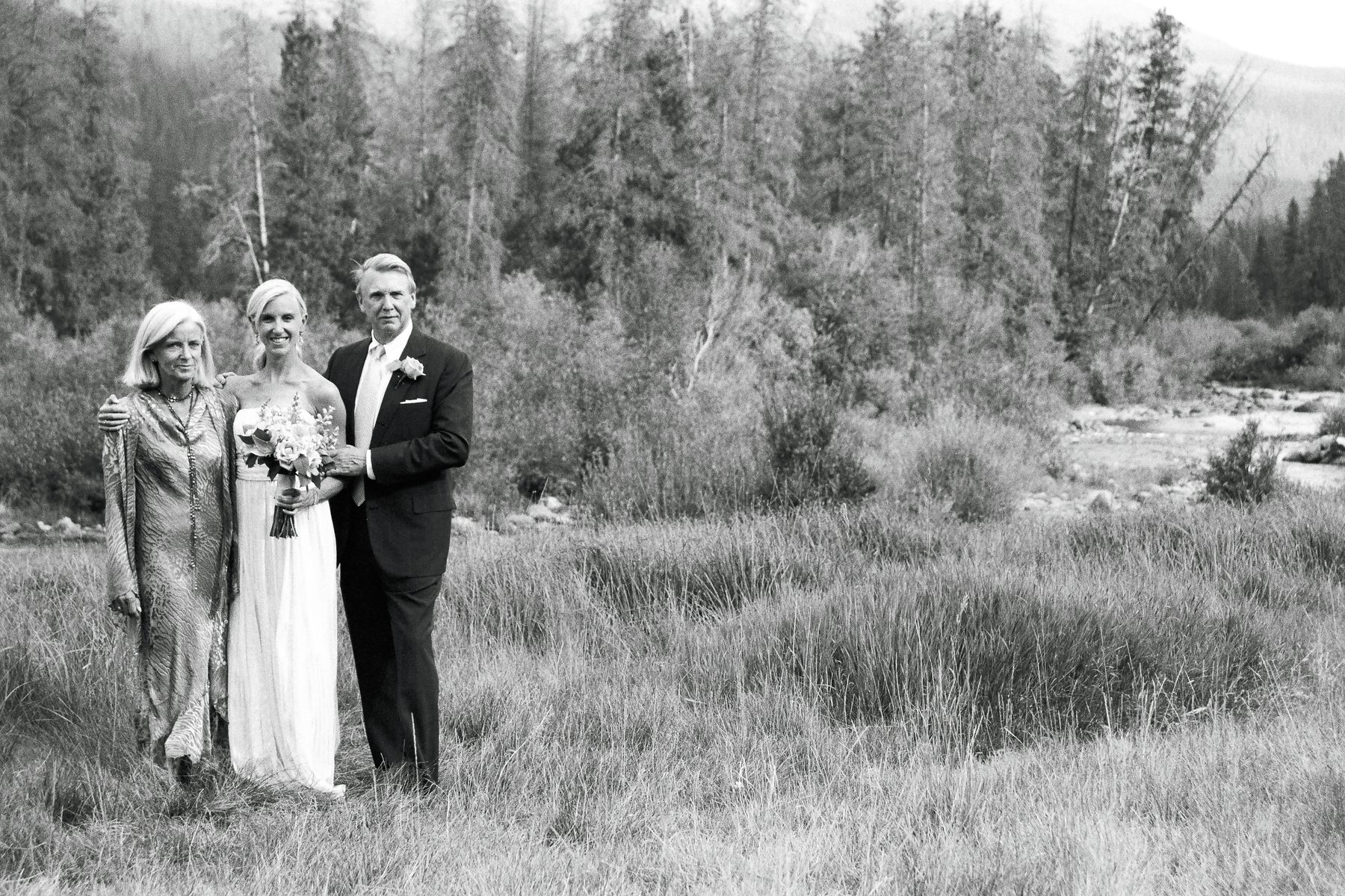 Black and white portrait with Lang and her parents